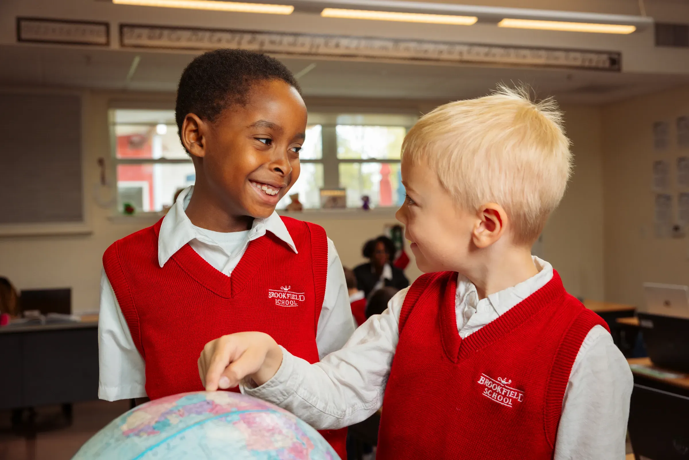 Two students outside during recess play