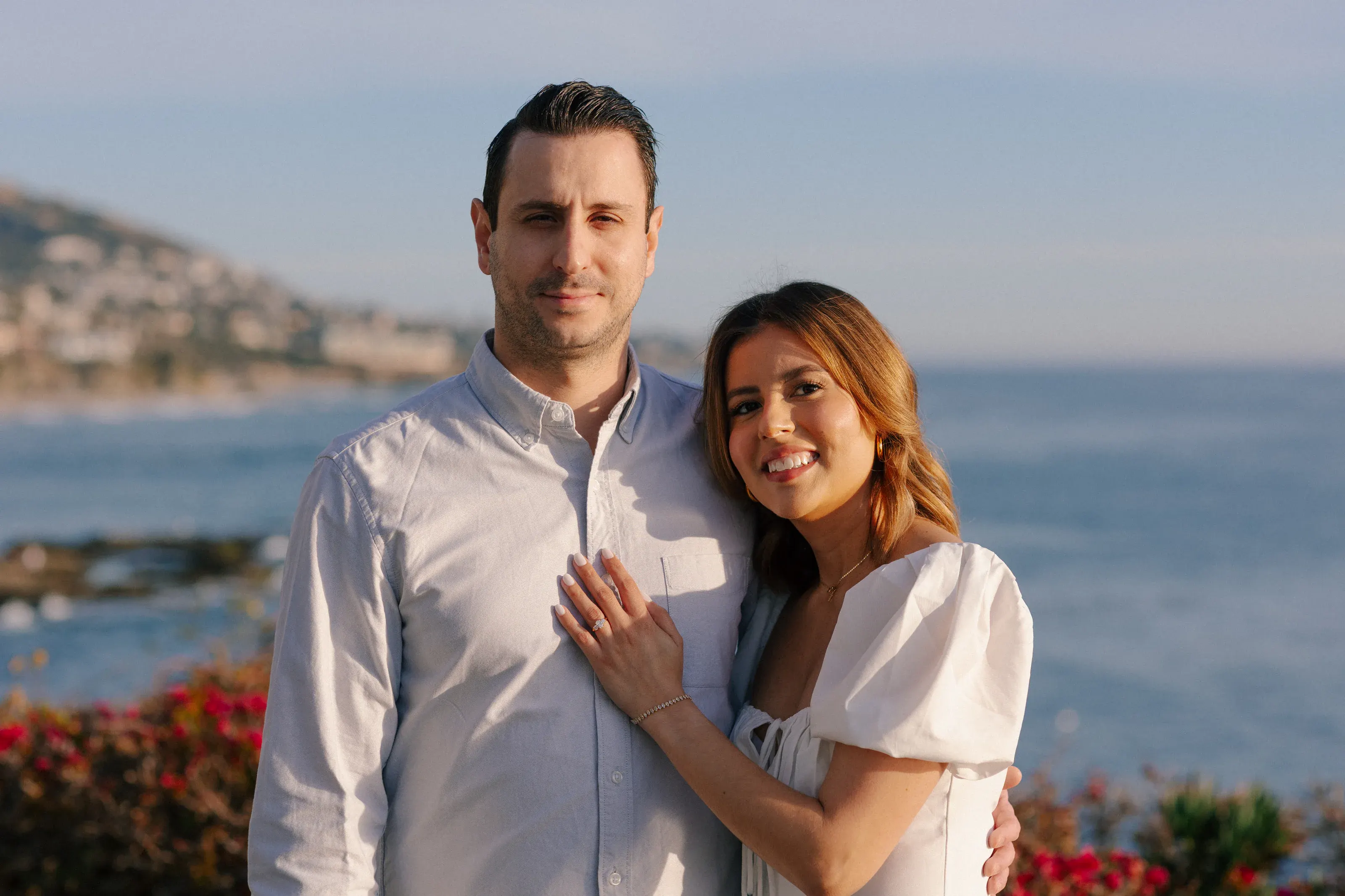 Relaxed coastal engagement portrait