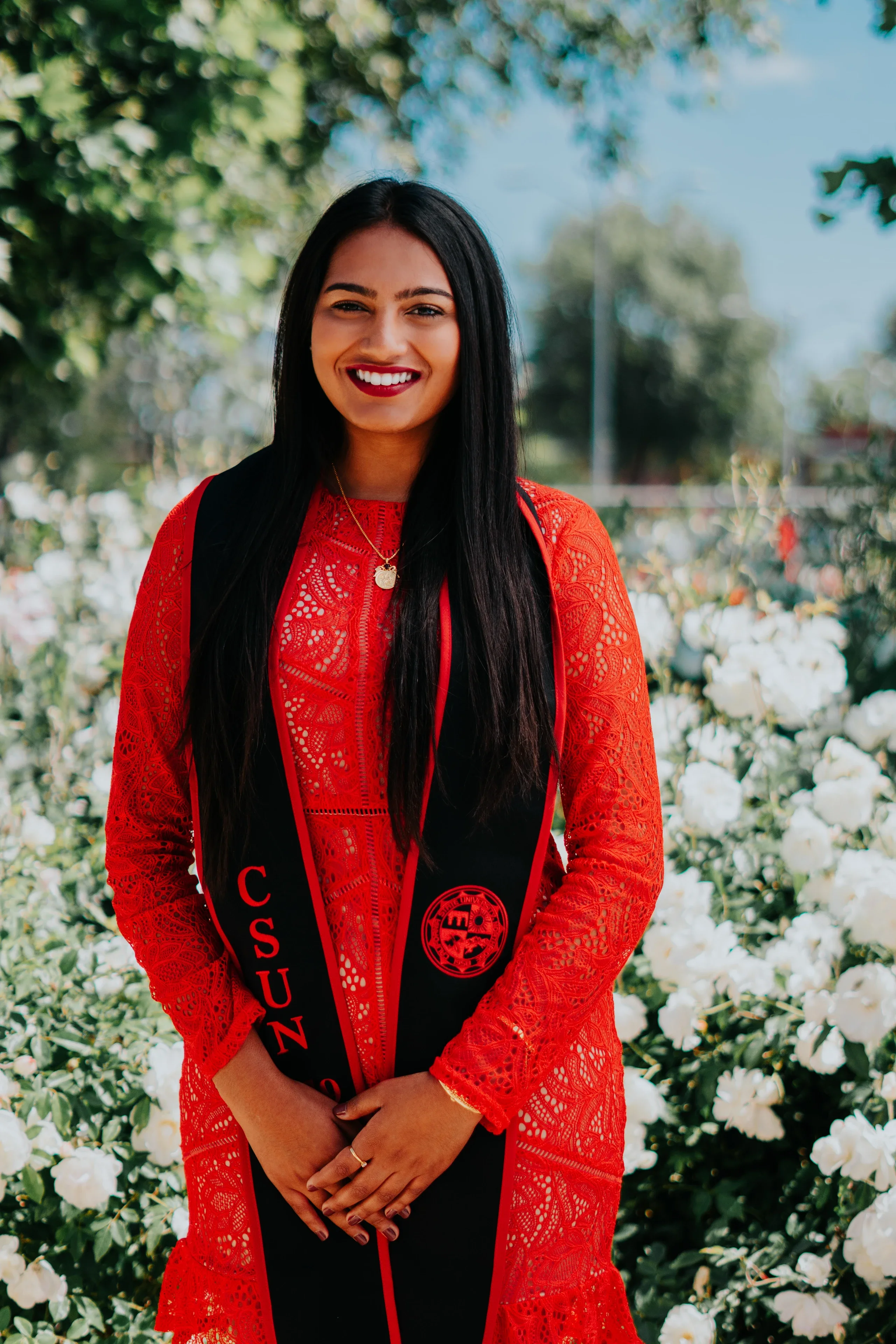 Close portrait highlighting Cal State Fullerton graduation regalia