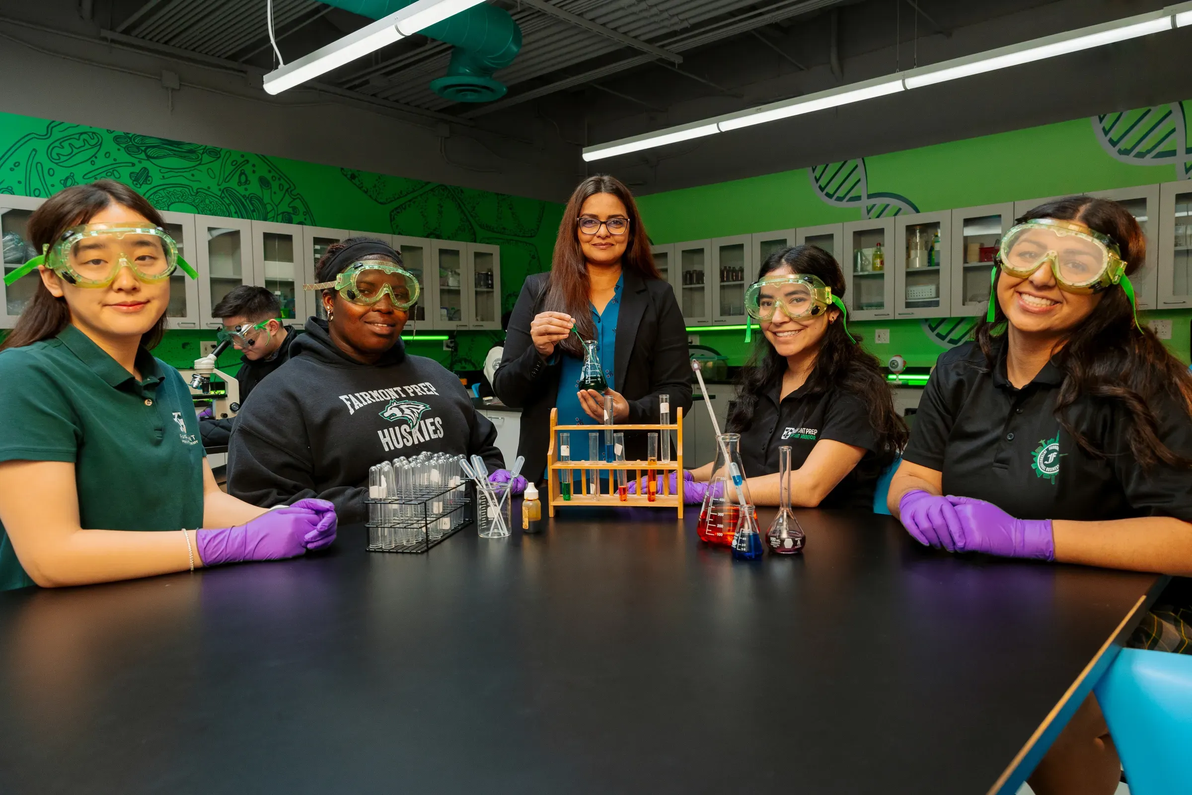 Students and teacher during a science lab session
