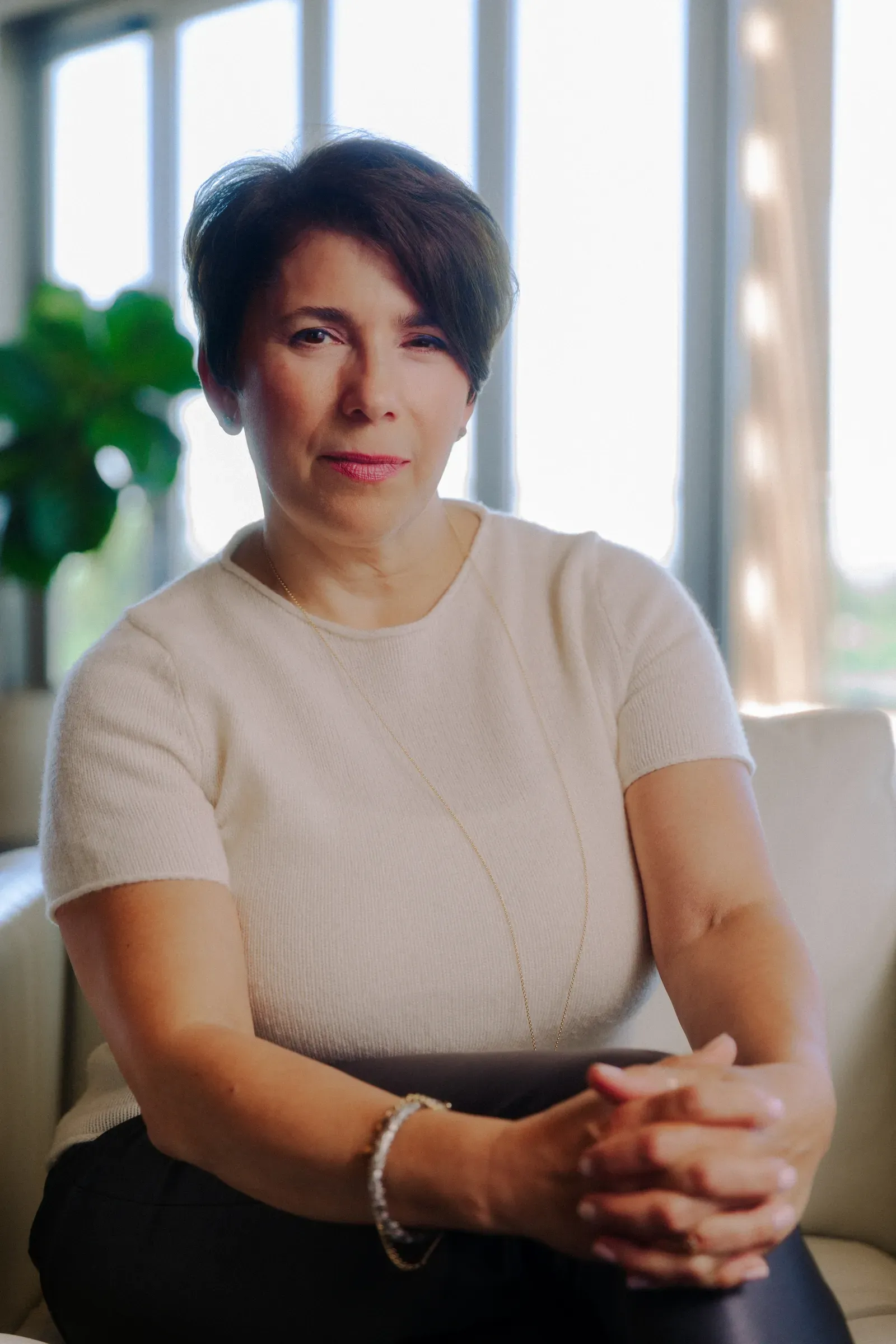 Executive portrait of a woman in natural window light